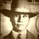 Sheriff Erv Kelly, wird 1932 von Floyd erschossen, als er diesen verhaften will